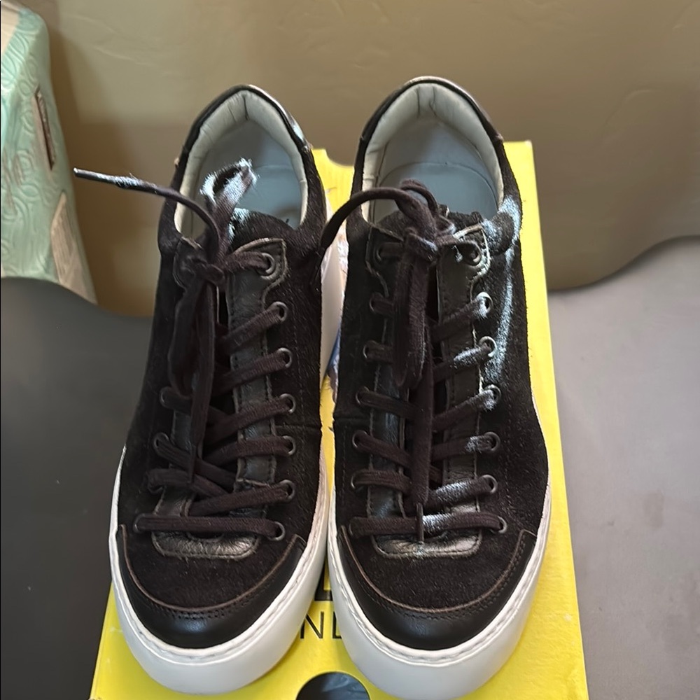 Black and White Sneakers 
They run small.